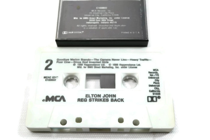 ELTON JOHN - Vintage Cassette Tape - REG STRIKES BACK The Vintedge Co.